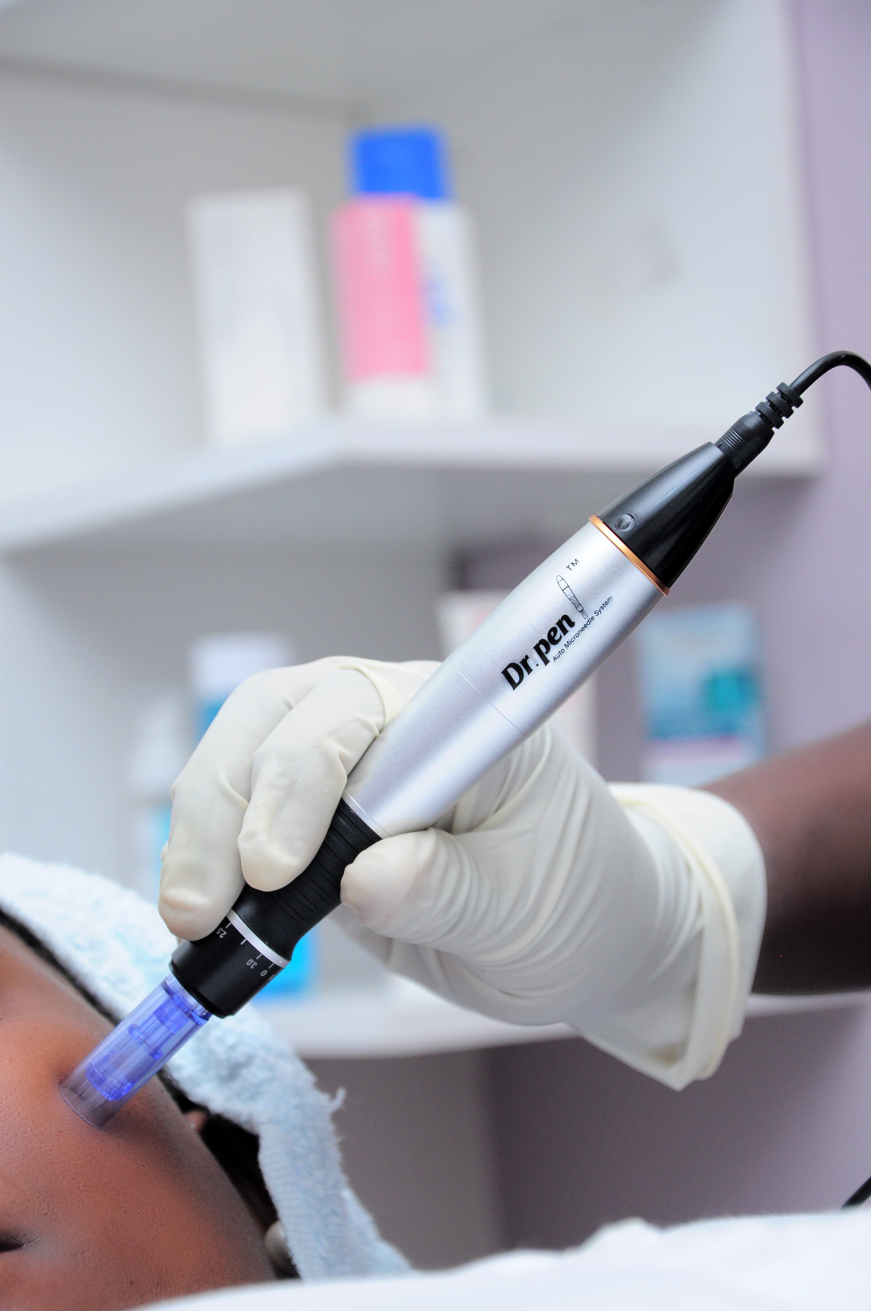 Microneedling treatment in progress at Kampala Dermatology